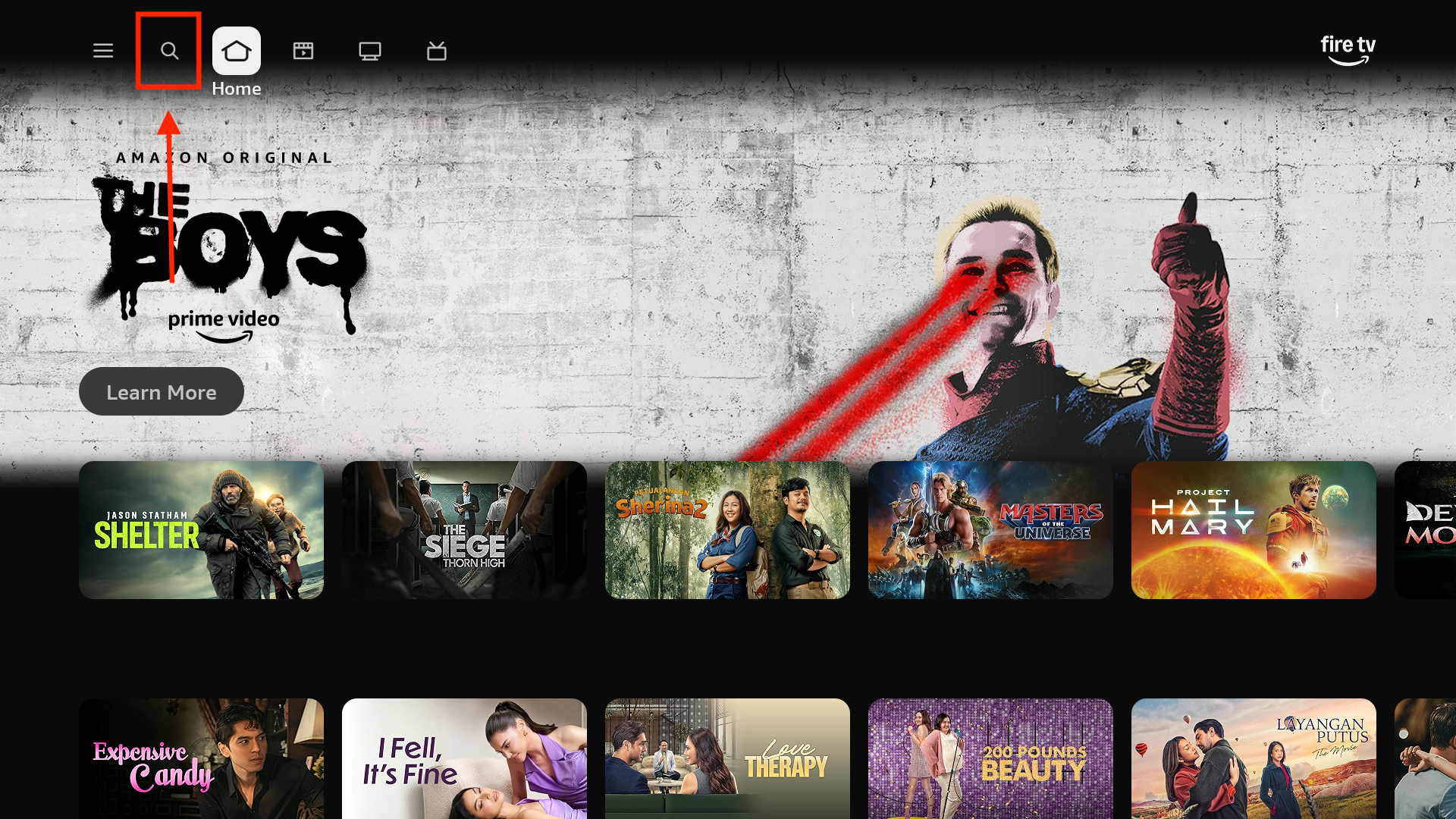 Početni ekran Fire TV uređaja sa označenom ikonicom lupe u gornjem lijevom uglu.